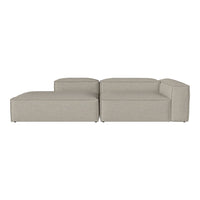 Light beige sectional sofa with a smooth, minimalist design and no visible patterns. Ideal for modern interiors.