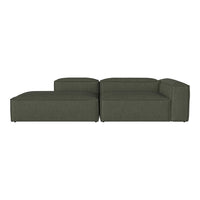 Dark green sectional sofa with a modern, minimalist design and smooth fabric texture. Perfect for contemporary decor.