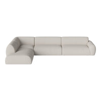Light beige sectional sofa with smooth, minimalist design and soft, uniform fabric texture, perfect for modern spaces.