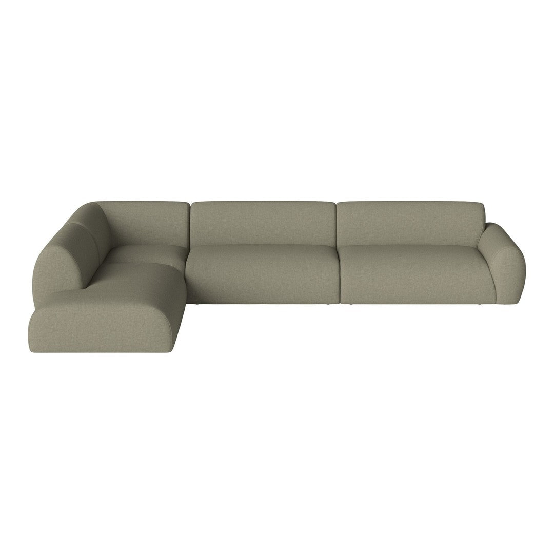Stylish modular sofa in soft olive green fabric with a smooth, minimalistic design. Perfect for modern interiors.