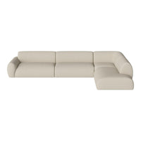 Cream-colored sectional sofa with a modern, minimalist design and smooth, textured upholstery. Perfect for any decor.
