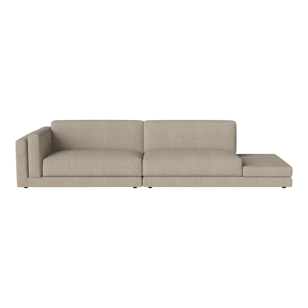 Beige sectional sofa with a smooth, textured fabric and minimalist design, perfect for modern living spaces.