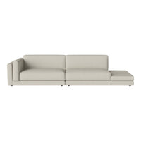 Light beige sectional sofa with a smooth, minimalist design and no visible patterns, perfect for modern interiors.