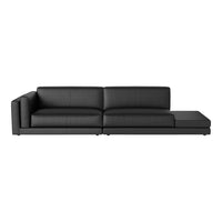 Modern black sectional sofa with a sleek, minimalist design and smooth, textured upholstery. Perfect for contemporary decor.