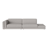 Light gray sectional sofa with a minimalist design and smooth, untextured upholstery. Perfect for modern living spaces.