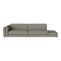 Modern gray sectional sofa with clean lines and a minimalist design, perfect for contemporary living spaces.