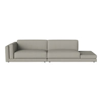 Light gray sectional sofa with a smooth, modern design and clean lines, perfect for contemporary interiors.