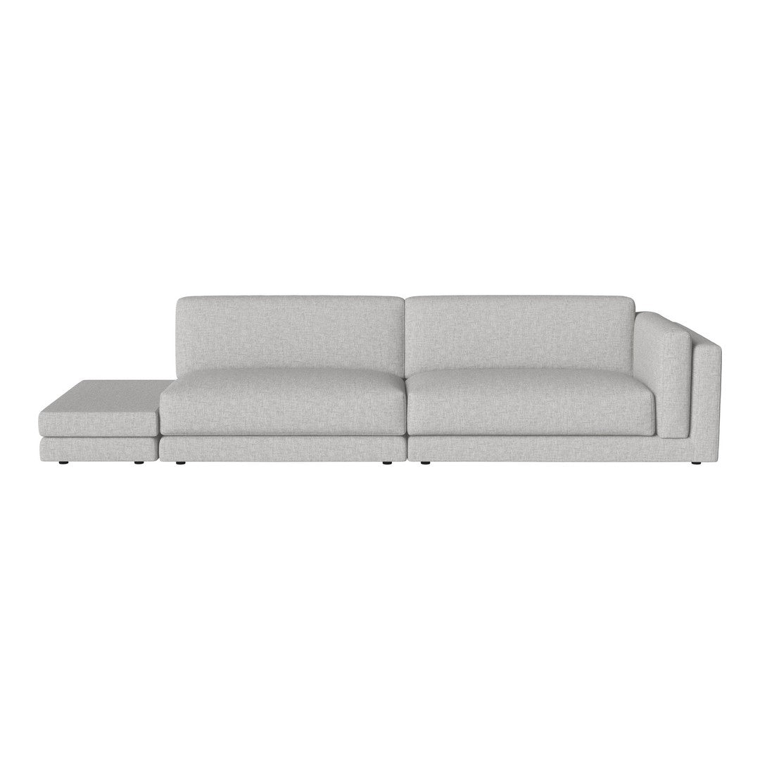 Light gray sectional sofa with a smooth, solid fabric pattern and modern design, perfect for contemporary living spaces.