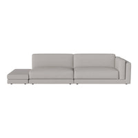 Light gray modern sectional sofa with clean lines and no visible patterns, ideal for minimalist decor.