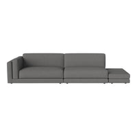 Modern gray sectional sofa with a sleek design and clean lines, perfect for contemporary living spaces.