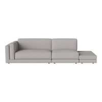 Light gray sectional sofa with a modern design, featuring smooth, minimalist lines and no visible patterns.