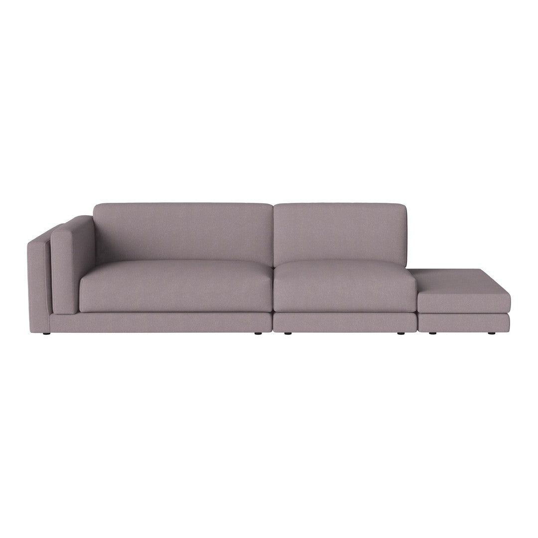 Modern light gray sectional sofa with clean lines and a minimalist design, perfect for contemporary living spaces.