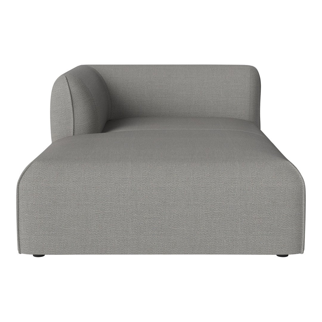 Stylish light gray chaise lounge with a smooth, modern fabric texture and minimalist design. Perfect for contemporary decor.