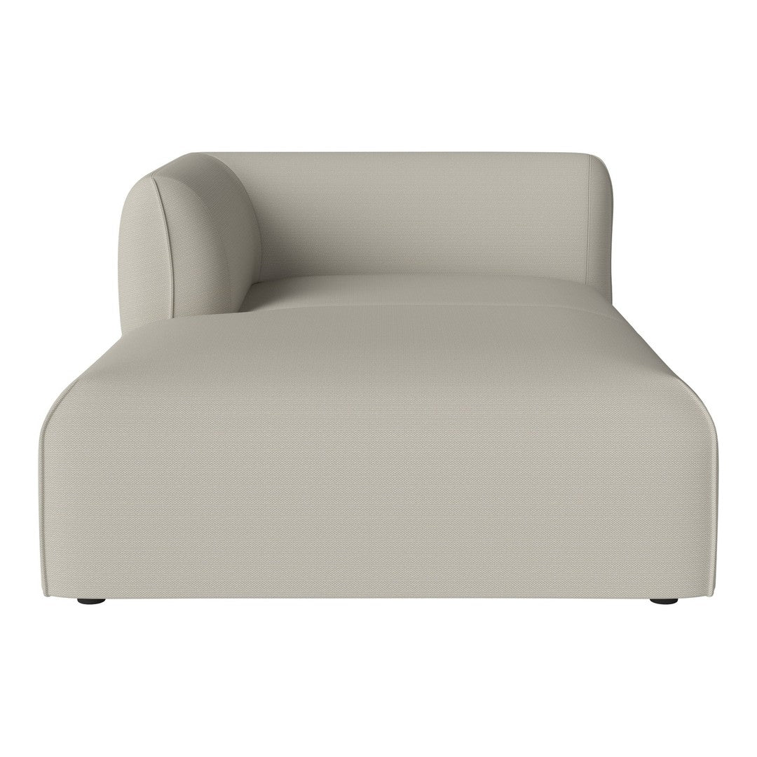 Beige modern chaise lounge featuring a minimalist design and smooth texture. Perfect for contemporary decor.