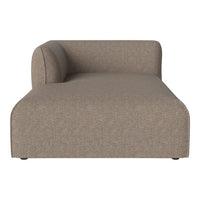 Textured beige chaise lounge with a smooth, modern design and curved backrest. Perfect for stylish living spaces.