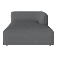 Gray upholstered chaise lounge with a textured fabric pattern and a modern, minimalist design.