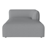Stylish gray chaise lounge with a smooth, textured fabric. Modern design perfect for contemporary decor.
