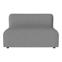 Gray minimalist sofa with smooth, solid fabric and curved edges, perfect for modern decor.
