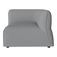 Gray upholstered sofa section with a textured pattern, featuring a modern, rounded design for contemporary interiors.