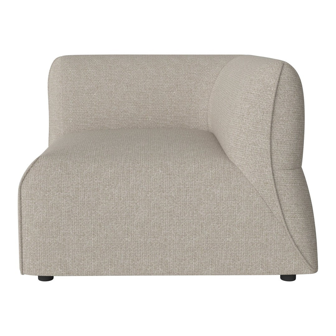 Beige curved sofa section with a smooth textured fabric, perfect for modern minimalist decor.