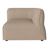 Beige fabric sectional sofa with a smooth, curved silhouette and subtle texture, perfect for modern decor.
