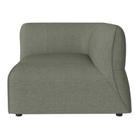 Olive green curved sectional sofa with a textured fabric finish and clean, contemporary lines.