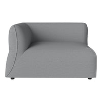Gray textured sectional sofa with a modern, minimalist design and curved armrest. Ideal for contemporary interiors.