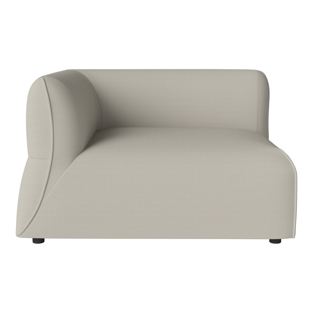 Modern curved sofa in soft beige with a smooth surface and minimalist design, ideal for contemporary decor.