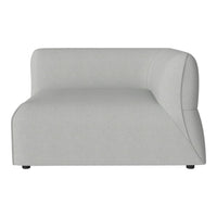 Curved gray sofa with a smooth, modern design and subtle textured fabric. Perfect for contemporary interiors.
