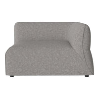 Light gray upholstered couch with a smooth, textured pattern and a modern, curved silhouette.