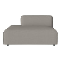 Gray fabric chaise lounge with a minimalist design and smooth, solid color pattern. Ideal for modern decor.