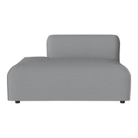 Gray chaise lounge with a smooth, textured fabric in a contemporary design. Perfect for modern living spaces.