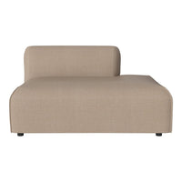 Beige upholstered modular sofa with a smooth, minimalist design and subtle texture. Perfect for modern living spaces.