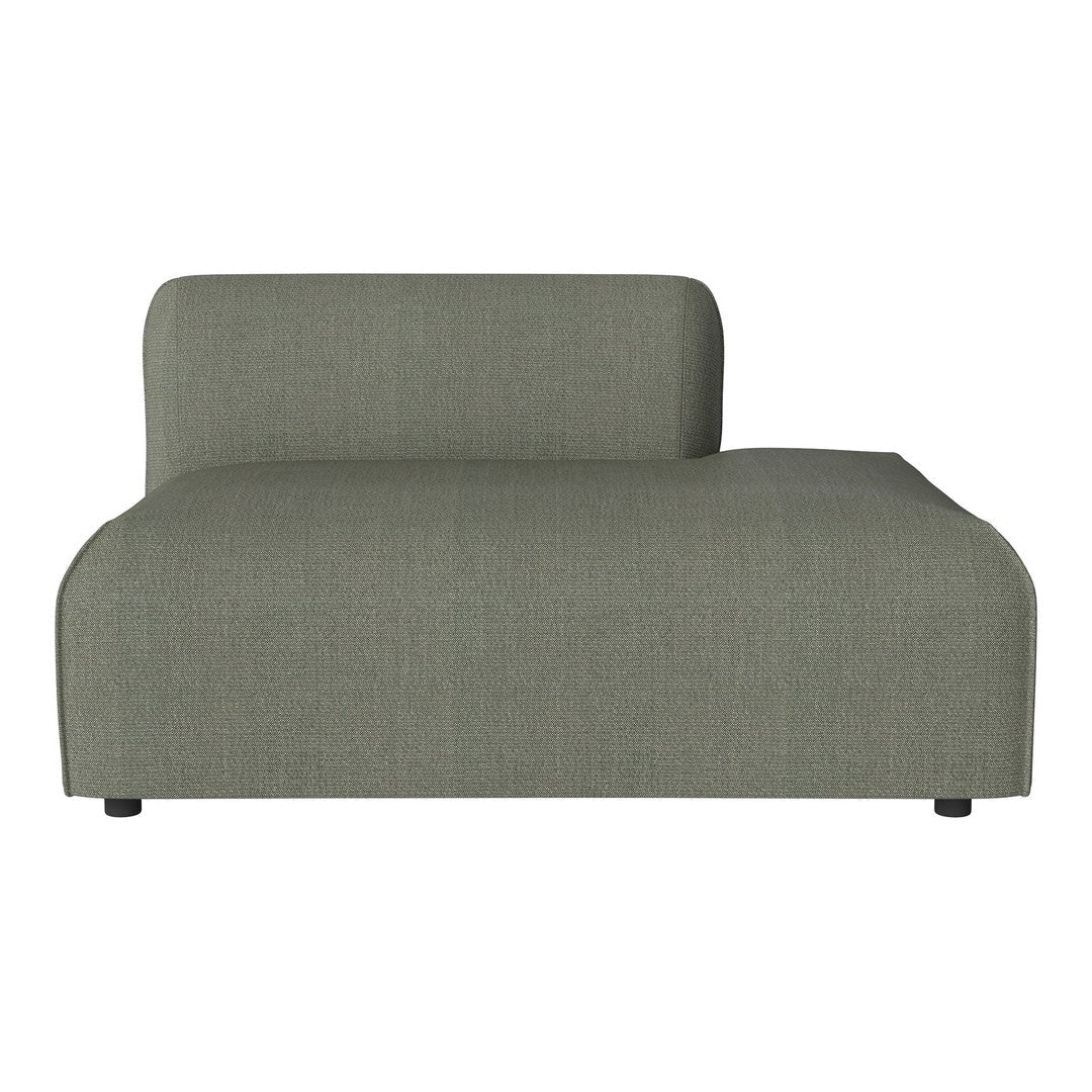 Sleek, modern chaise lounge in a soft gray fabric with a subtle textured pattern. Ideal for contemporary spaces.