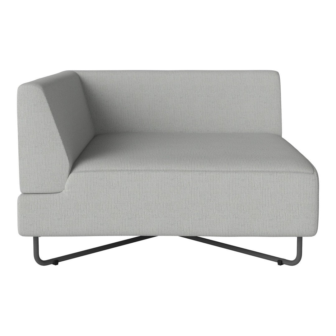 Modern gray chaise lounge with clean lines and a minimalist design, featuring a textured fabric surface.