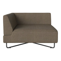 Brown fabric corner sofa with a simple, modern design and a smooth texture. Sleek metal base complements the look.