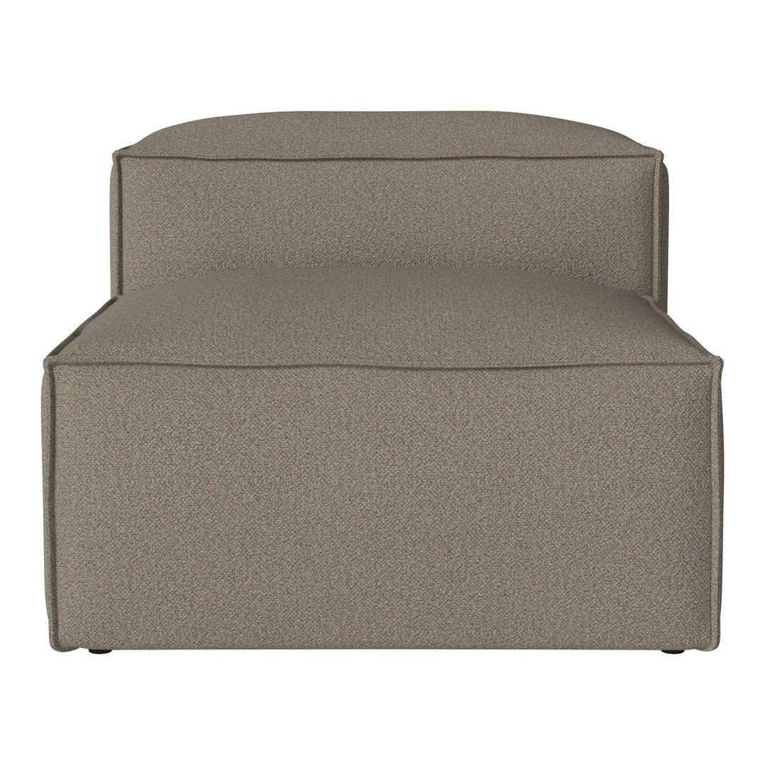 Taupe upholstered lounge chair with a textured surface and minimalist design, perfect for modern interiors.