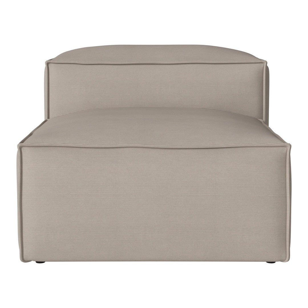 Beige upholstered chaise lounge with a smooth, minimalist design and subtle stitching detail. Perfect for modern decor.