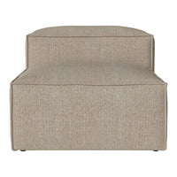 Beige textured fabric chaise lounge with a minimalist design and subtle speckled pattern. Ideal for modern decor.