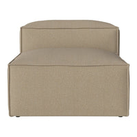 Beige upholstered chaise lounge with smooth, solid pattern and clean, modern lines. Ideal for contemporary decor.