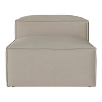 Soft beige upholstered ottoman with a minimalist design and clean lines, perfect for modern interiors.