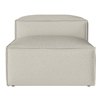 Beige upholstered ottoman with clean lines and a seamless design, perfect for modern interior decor.