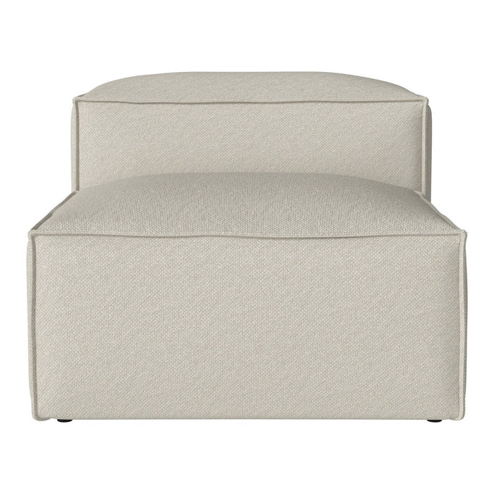 Beige upholstered ottoman with clean lines and a seamless design, perfect for modern interior decor.