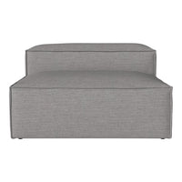 Gray upholstered modular sofa with a smooth, textured fabric and clean lines. Perfect for modern living spaces.