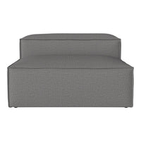 Gray textured fabric lounge chair with a contemporary, minimal design. Ideal for modern living spaces.