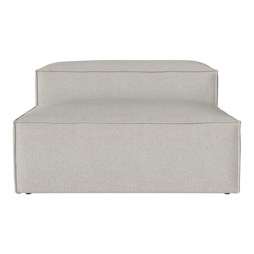 Light beige upholstered lounge chair with a smooth, minimalist design and subtle texture. Ideal for modern decor.