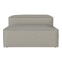 Modern gray upholstered ottoman with a simple, solid pattern and sleek lines. Perfect for stylish decor.