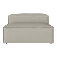 Stylish beige upholstered ottoman with a minimalist design and smooth texture, perfect for modern decor.