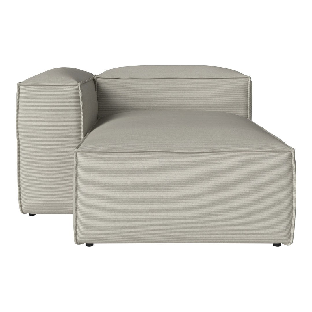 Light gray modular couch with smooth, modern lines and a subtle textured pattern. Ideal for minimalist decor.