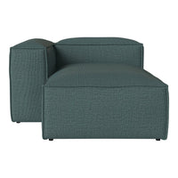 Teal textured lounge chair with a modern, minimalist design, featuring clean lines and a boxy silhouette.